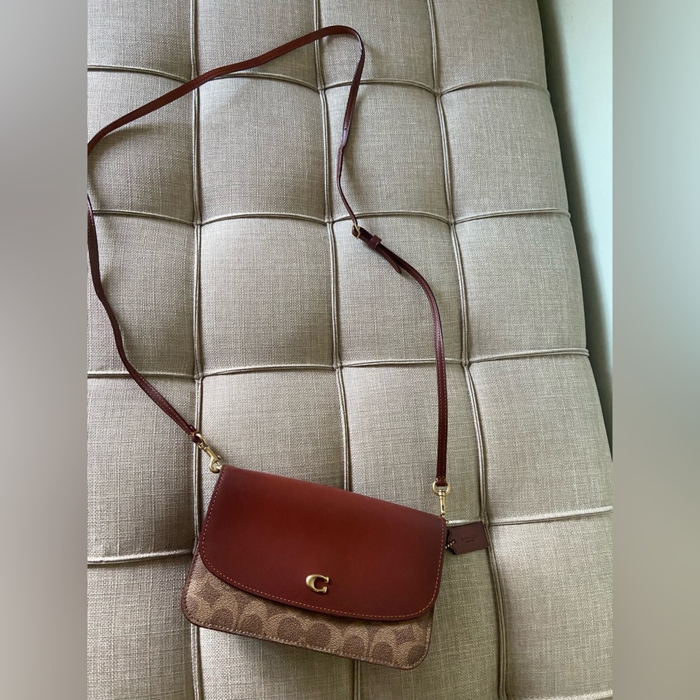 Coach crossbody bag. Used once excellent condition. Brown/cognac color.